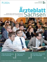 Tagungsteilnehmer sitzen im Konferenzraum