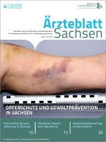 Oberarm mit Hämatom, davor ein Lineal